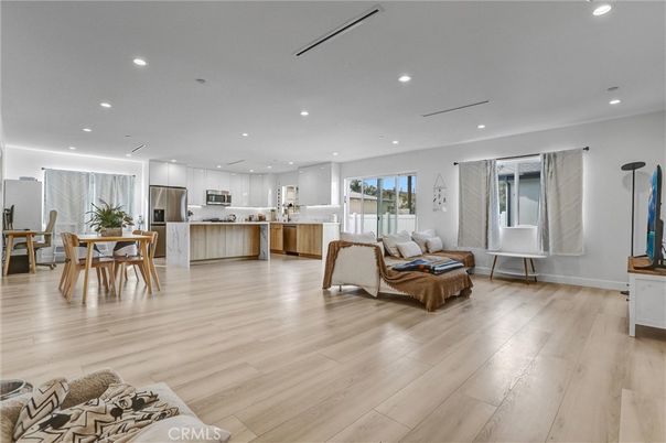 Dining room, Interior, Kitchen, Living room, Recessed Lighting, Stainless Steel Appliances, Wood Texture Flooring