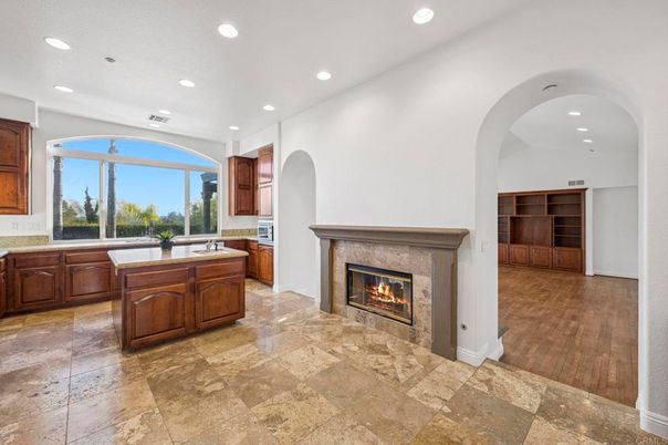 Fireplace, Interior, Kitchen, Recessed Lighting, Wood Texture Flooring