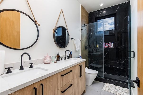 Bathroom, Dual Sink Vanities, Glass Shower, Interior, Marble Walls, Recessed Lighting