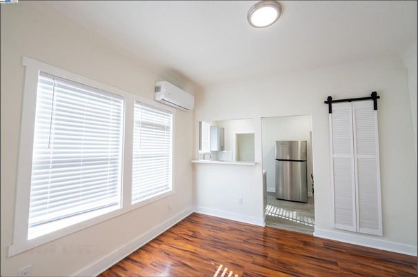 Empty room, Interior, Kitchen, Stainless Steel Appliances, Wood Texture Flooring