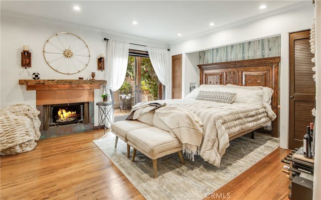 Bedroom, Fireplace, Interior, Recessed Lighting, Wood Texture Flooring