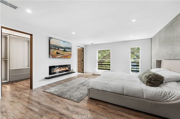 Bedroom, Fireplace, Interior, Recessed Lighting, Wood Texture Flooring
