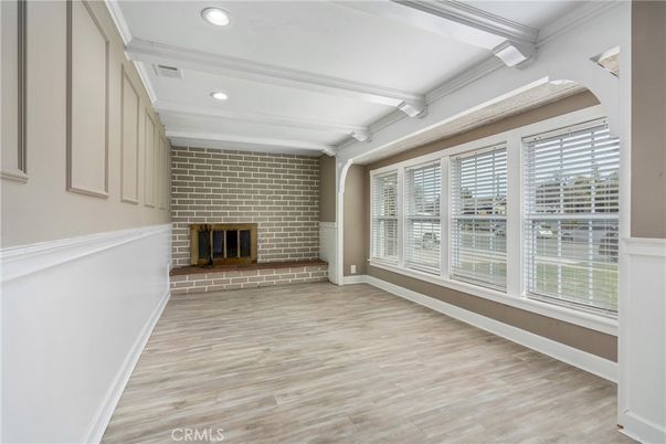 Empty room, Fireplace, Interior, Recessed Lighting, Stone Walls, Wood Texture Flooring