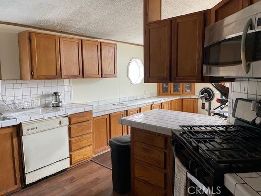 Interior, Kitchen, Tile Countertops, Wood Texture Flooring