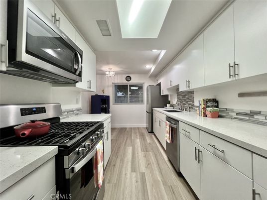 Interior, Kitchen, Recessed Lighting, Stainless Steel Appliances, Wood Texture Flooring