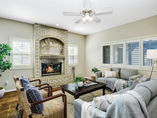 Fireplace, Interior, Living room, Recessed Lighting, Stone Walls, Wood Texture Flooring