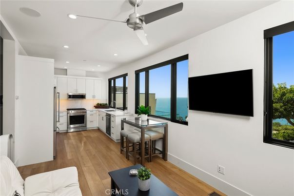 Interior, Kitchen, Recessed Lighting, Stainless Steel Appliances, Water, Wood Texture Flooring
