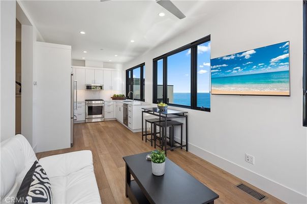 Interior, Kitchen, Recessed Lighting, Stainless Steel Appliances, Water, Wood Texture Flooring