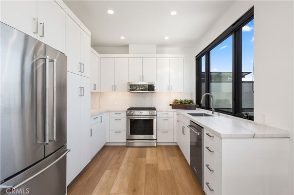 Interior, Kitchen, Recessed Lighting, Stainless Steel Appliances, Wood Texture Flooring