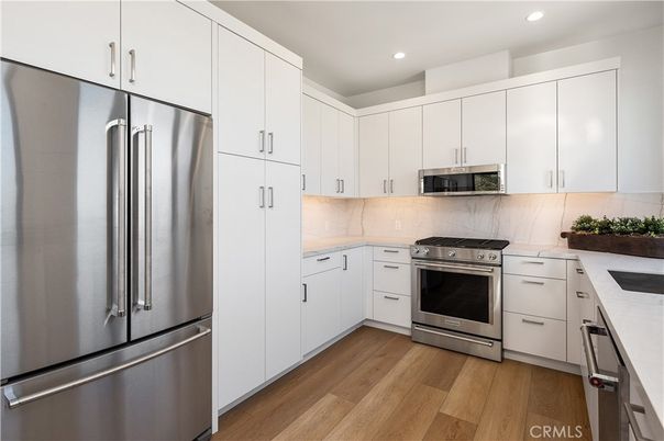 Interior, Kitchen, Recessed Lighting, Stainless Steel Appliances, Wood Texture Flooring