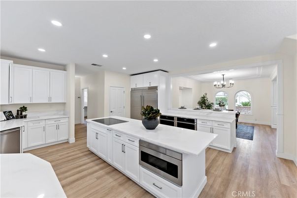 Chandelier, Interior, Kitchen, Recessed Lighting, Stainless Steel Appliances, Wood Texture Flooring