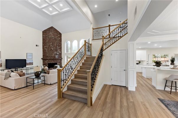 Fireplace, Interior, Living room, Recessed Lighting, Stone Walls, Wood Texture Flooring