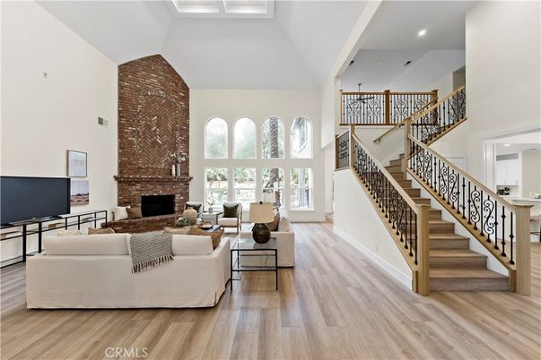 Fireplace, Interior, Living room, Recessed Lighting, Stone Walls, Wood Texture Flooring