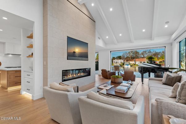 Fireplace, Interior, Living room, Piano, Recessed Lighting, Stone Walls, Wood Texture Flooring