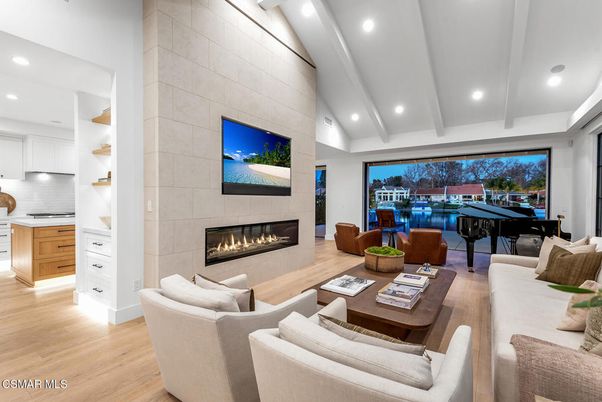 Fireplace, Interior, Living room, Piano, Recessed Lighting, Stone Walls, Wood Texture Flooring