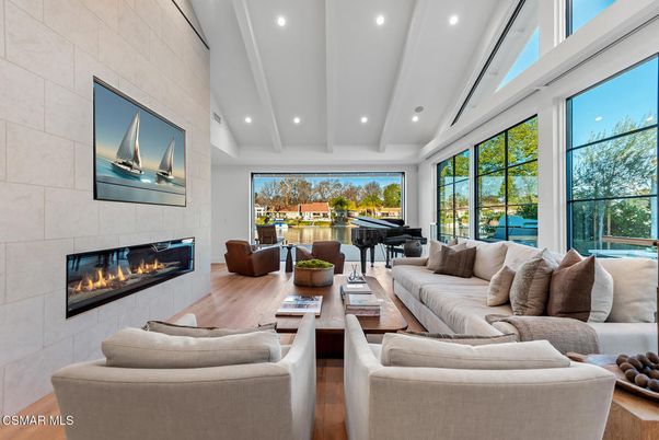 Fireplace, Interior, Living room, Piano, Recessed Lighting, Stone Walls, Wood Texture Flooring