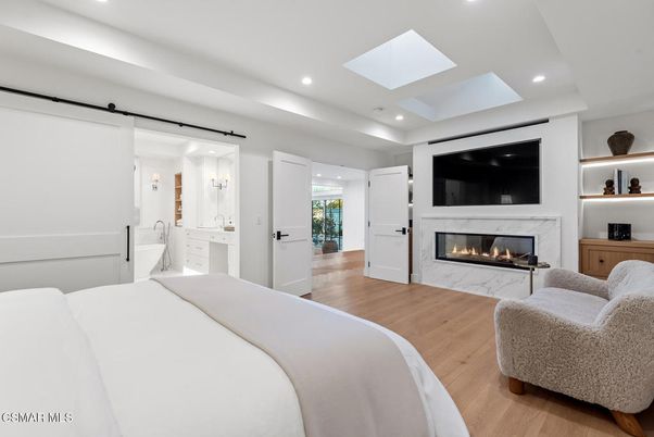 Bedroom, Fireplace, Interior, Recessed Lighting, Wood Texture Flooring