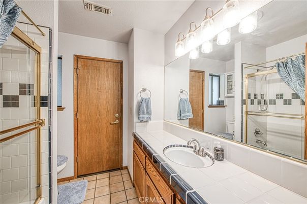 Bathroom, Dual Sink Vanities, Glass Shower, Interior, Tile Countertops