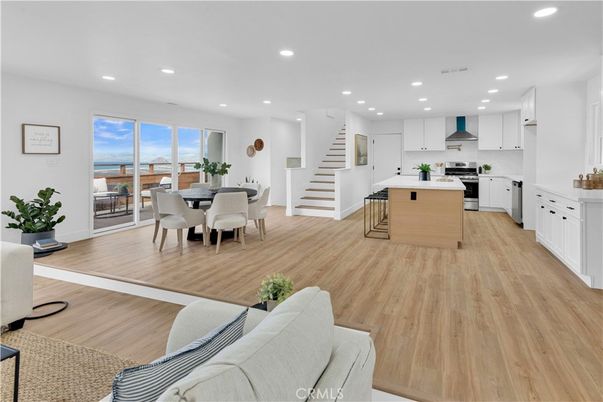 Dining room, Interior, Kitchen, Recessed Lighting, Stainless Steel Appliances, Water, Wood Texture Flooring