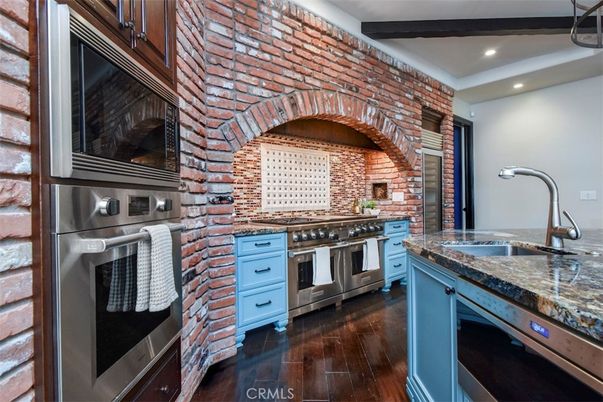 Interior, Kitchen, Recessed Lighting, Stainless Steel Appliances, Stone Walls, Wood Texture Flooring