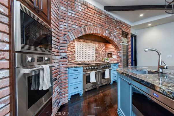 Interior, Kitchen, Recessed Lighting, Stainless Steel Appliances, Stone Walls, Wood Texture Flooring