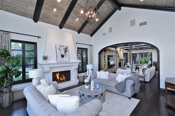 Chandelier, Dining room, Fireplace, Interior, Living room, Pendant Lights, Recessed Lighting, Wooden Beams, Wooden Ceilings, Wood Texture Flooring
