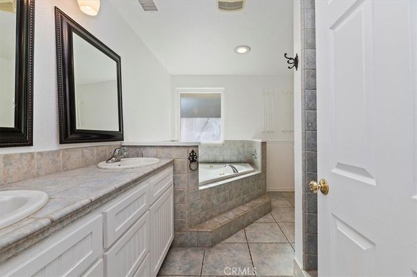 Bathroom, Dual Sink Vanities, Interior, Recessed Lighting, Tile Countertops