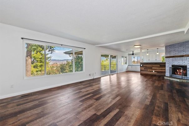 Empty room, Fireplace, Interior, Pendant Lights, Stone Walls, Wood Texture Flooring