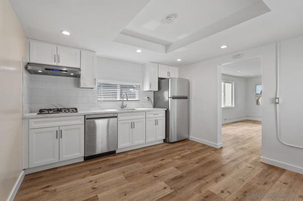 Interior, Kitchen, Recessed Lighting, Stainless Steel Appliances, Wood Texture Flooring