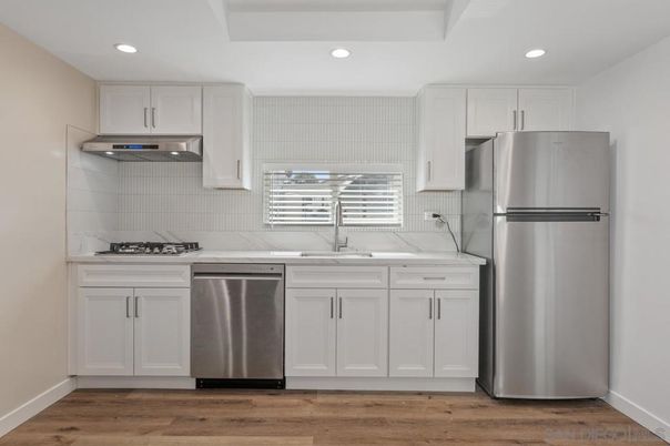 Interior, Kitchen, Recessed Lighting, Stainless Steel Appliances, Wood Texture Flooring