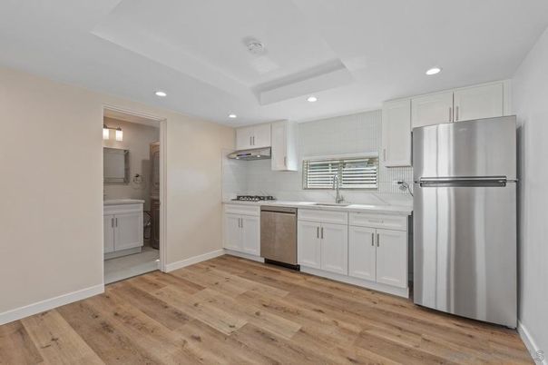 Interior, Kitchen, Recessed Lighting, Stainless Steel Appliances, Wood Texture Flooring