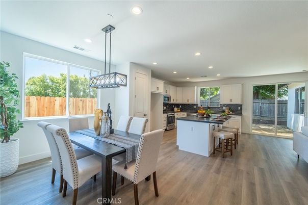 Dining room, Interior, Kitchen, Pendant Lights, Recessed Lighting, Stainless Steel Appliances, Wood Texture Flooring