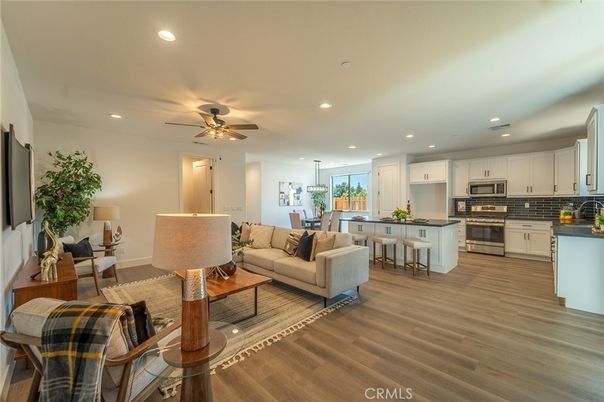 Dining room, Interior, Kitchen, Living room, Pendant Lights, Recessed Lighting, Stainless Steel Appliances, Wood Texture Flooring
