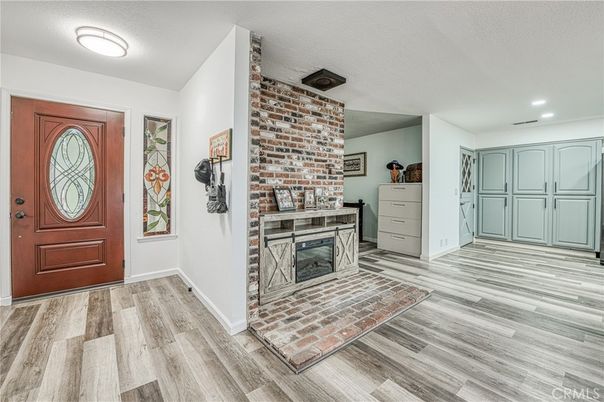 Fireplace, Interior, Recessed Lighting, Stone Walls, Wood Texture Flooring