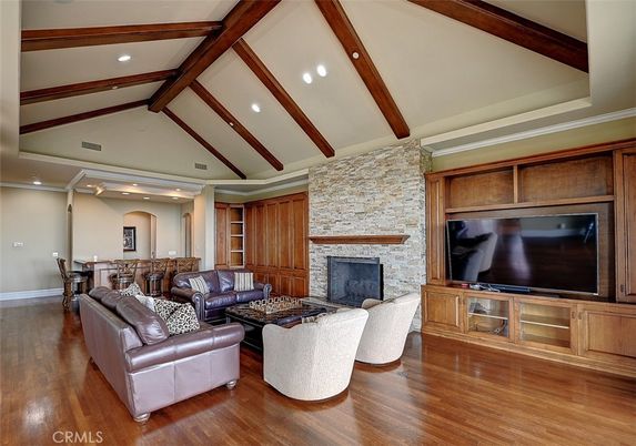 Dining room, Fireplace, Interior, Living room, Recessed Lighting, Stone Walls, Wooden Beams, Wood Texture Flooring