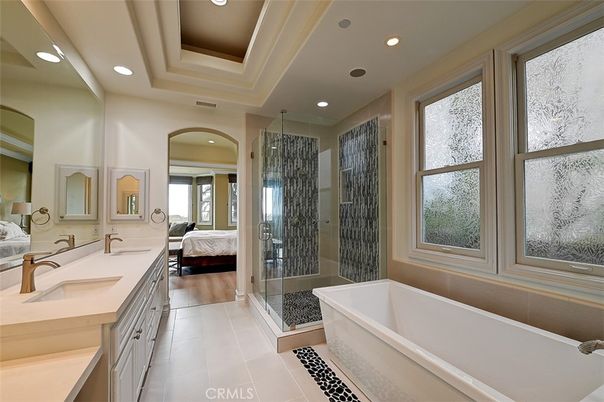 Bathroom, Bedroom, Dual Sink Vanities, Glass Shower, Interior, Recessed Lighting, Wood Texture Flooring
