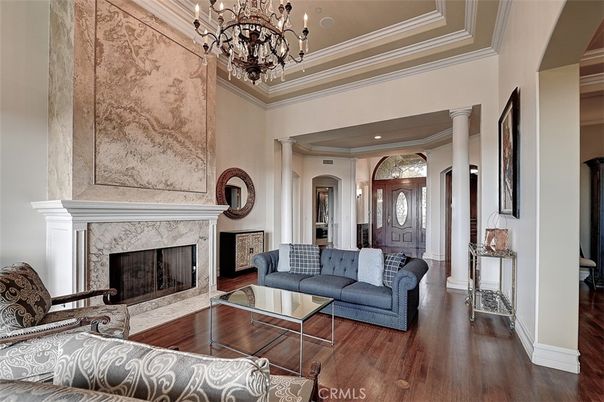 Chandelier, Fireplace, Interior, Living room, Recessed Lighting, Wood Texture Flooring