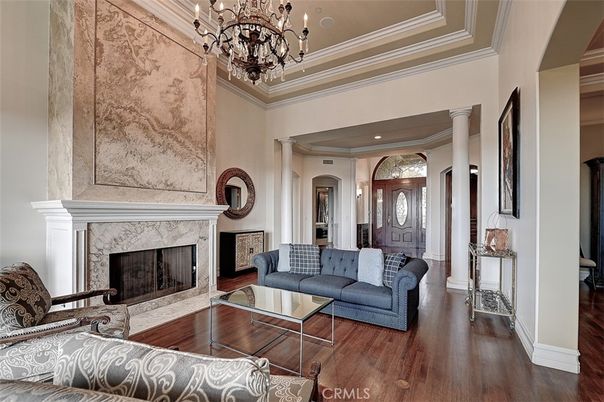 Chandelier, Fireplace, Interior, Living room, Recessed Lighting, Wood Texture Flooring
