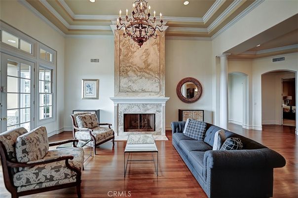 Chandelier, Fireplace, Interior, Living room, Recessed Lighting, Wood Texture Flooring