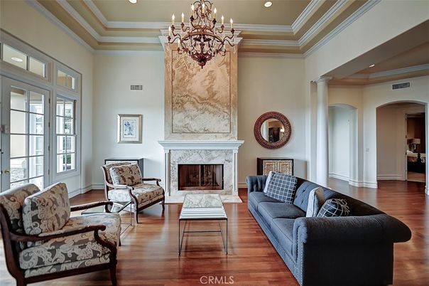 Chandelier, Fireplace, Interior, Living room, Recessed Lighting, Wood Texture Flooring