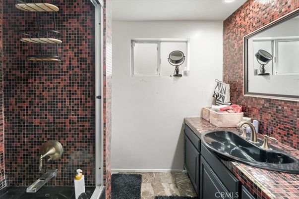 Bathroom, Dual Sink Vanities, Interior, Recessed Lighting, Tile Countertops
