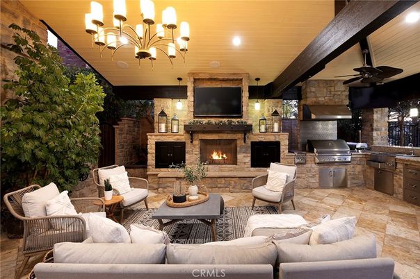 Chandelier, Fireplace, Interior, Living room, Stone Walls