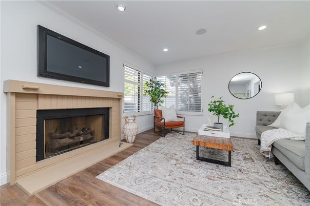 Fireplace, Interior, Living room, Recessed Lighting, Wood Texture Flooring
