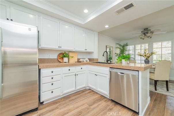 Dining room, Interior, Kitchen, Recessed Lighting, Stainless Steel Appliances, Wood Texture Flooring