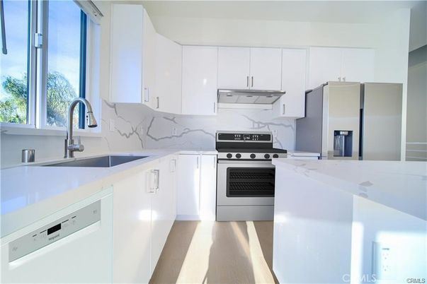 Interior, Kitchen, Marble Walls, Stainless Steel Appliances, Wood Texture Flooring