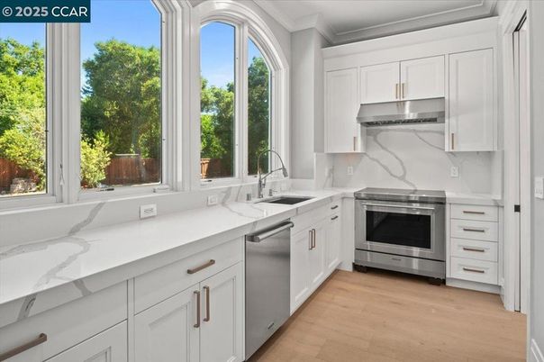 Interior, Kitchen, Marble Walls, Stainless Steel Appliances, Wood Texture Flooring