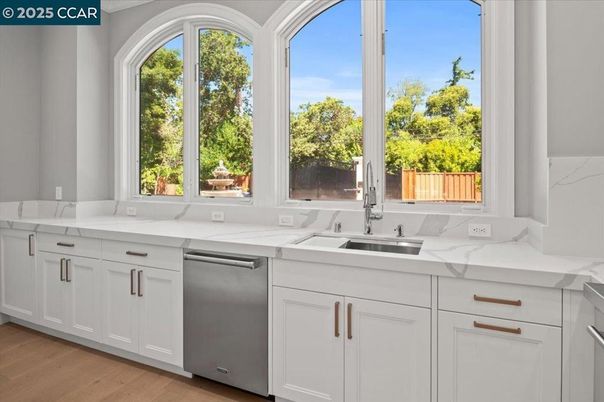 Interior, Kitchen, Marble Walls, Stainless Steel Appliances, Wood Texture Flooring