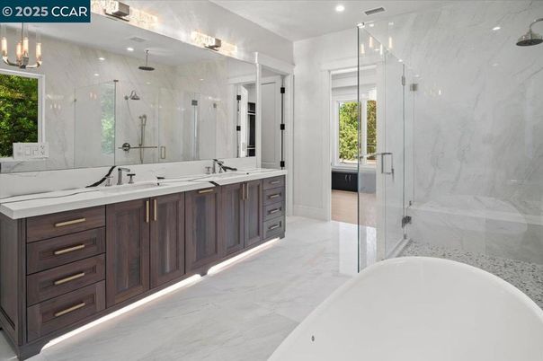 Bathroom, Free Standing Baths, Glass Shower, Interior, Marble, Marble Walls, Pendant Lights, Recessed Lighting