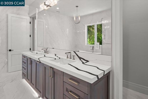 Bathroom, Dual Sink Vanities, Free Standing Baths, Glass Shower, Interior, Marble, Marble Walls, Recessed Lighting