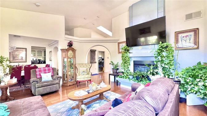 Fireplace, Interior, Living room, Piano, Recessed Lighting, Wood Texture Flooring